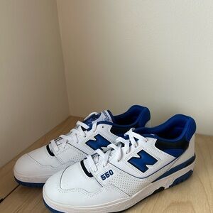 New Balance 550 low-top sneaker in white, royal blue, and black colorway
